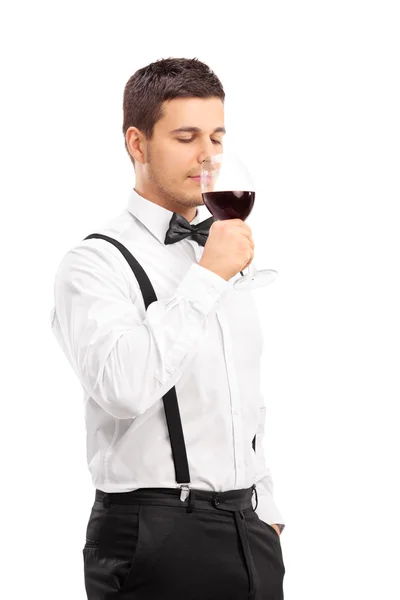 Elegant guy drinking red wine — Stock Photo, Image