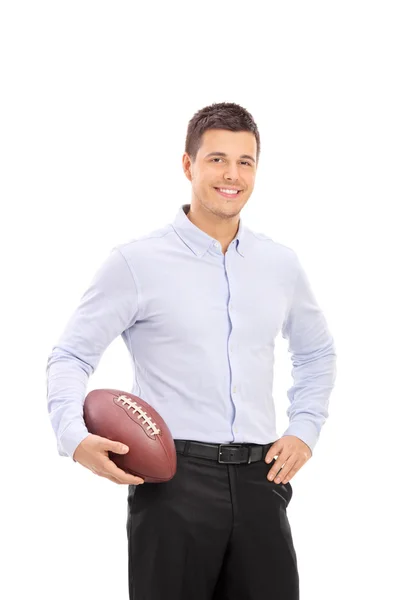 Man holding an American football — Stock Photo, Image