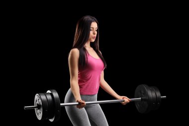 Genç kadın ile Halter egzersiz