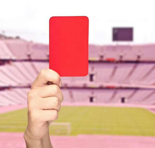 Hand holding a red card — Stock Photo, Image