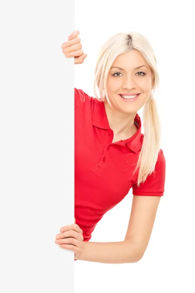 Blond woman behind blank panel — Stock Photo, Image