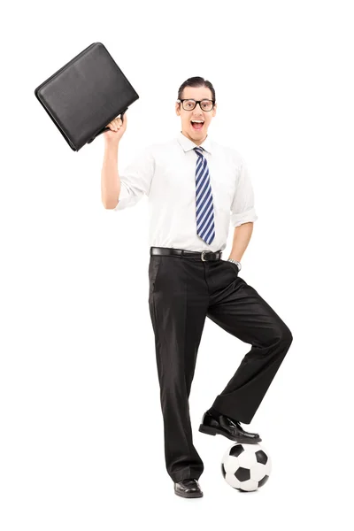 Joyful businessman posing with football — Stock Photo, Image