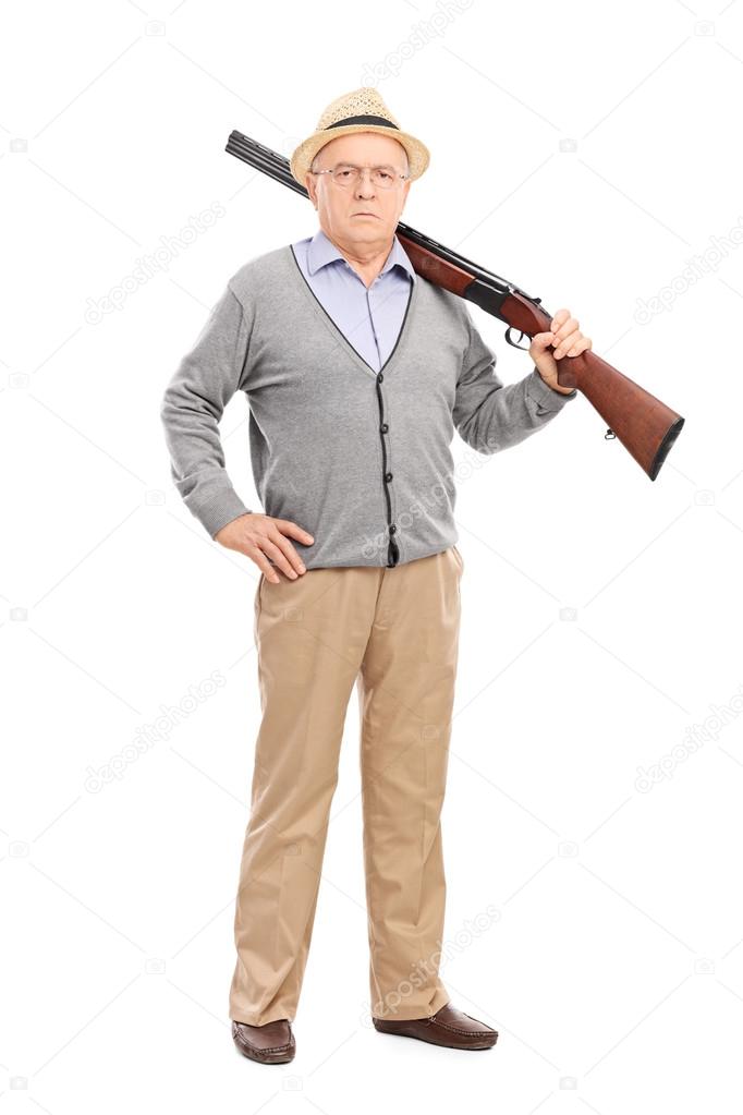 Senior gentleman with a rifle