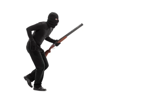 Stealthy criminal with rifle — Stock Photo, Image