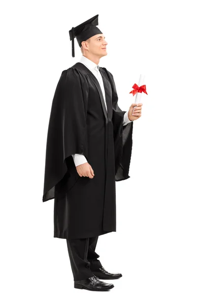 Proud college graduate holding diploma — Stock Photo, Image