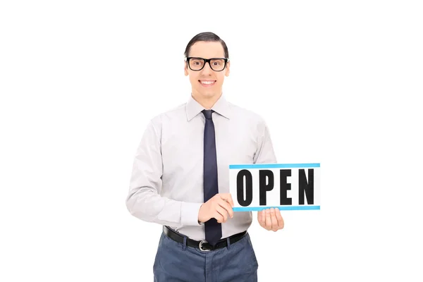 Store manager holding open sign — Stock Photo, Image