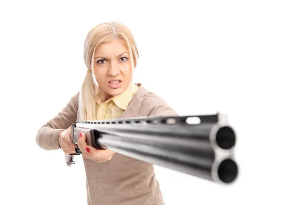 Angry girl with rifle — Stock Photo, Image