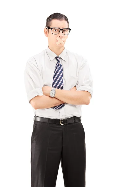 Businessman having his mouth shut — Stock Photo, Image