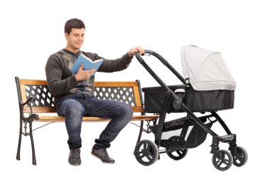 Young man holding baby stroller clipart