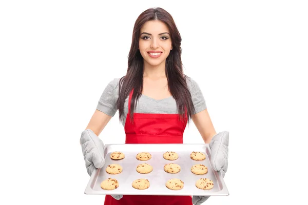 Woman holding pan of cookies — Stock Photo, Image