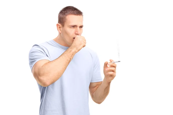 Man smoking cigarette and coughing — Stock Photo, Image