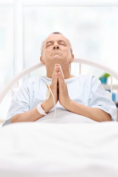 Male patient praying to god — Stock Photo, Image