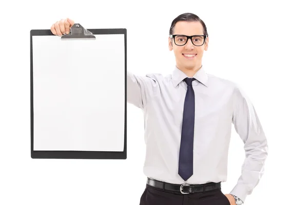 Young businessman holding clipboard — Stock Photo, Image