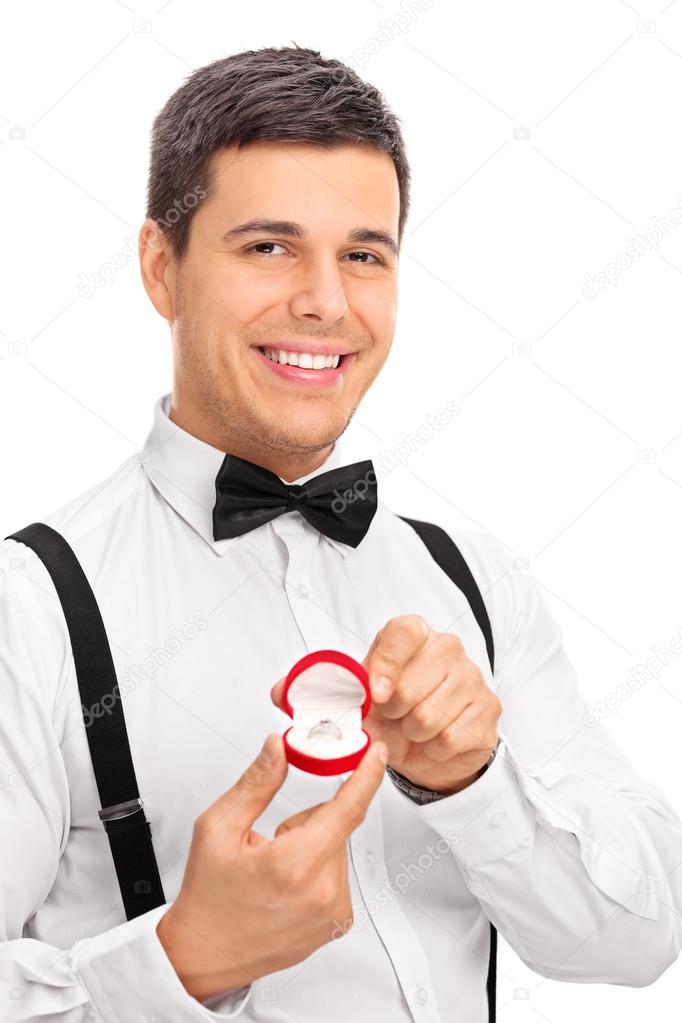 Man holding an engagement ring