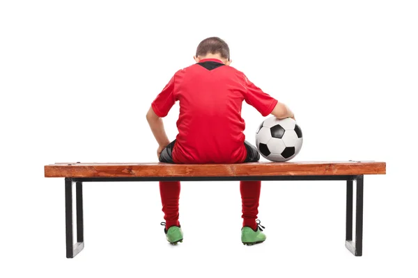 Sad little boy in soccer jersey — Stock Photo, Image