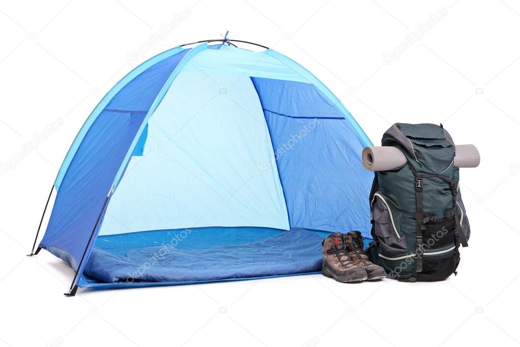 Blue tent with hiking equipment