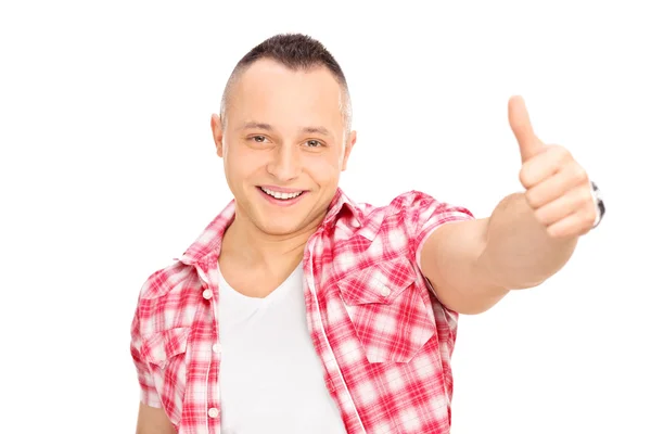 Joven dando un pulgar hacia arriba —  Fotos de Stock