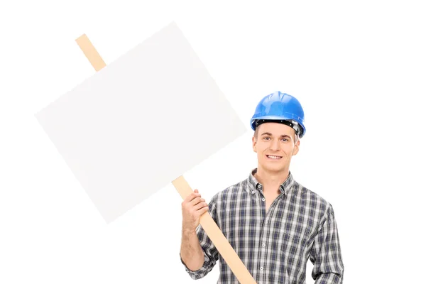 Construction worker holding a blank sign — Stock Photo, Image