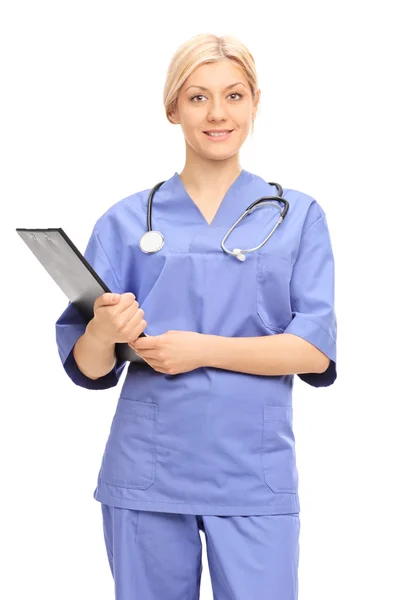 Vrouwelijke arts houden een Klembord — Stockfoto