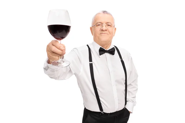 Senior herre med glas vin — Stockfoto