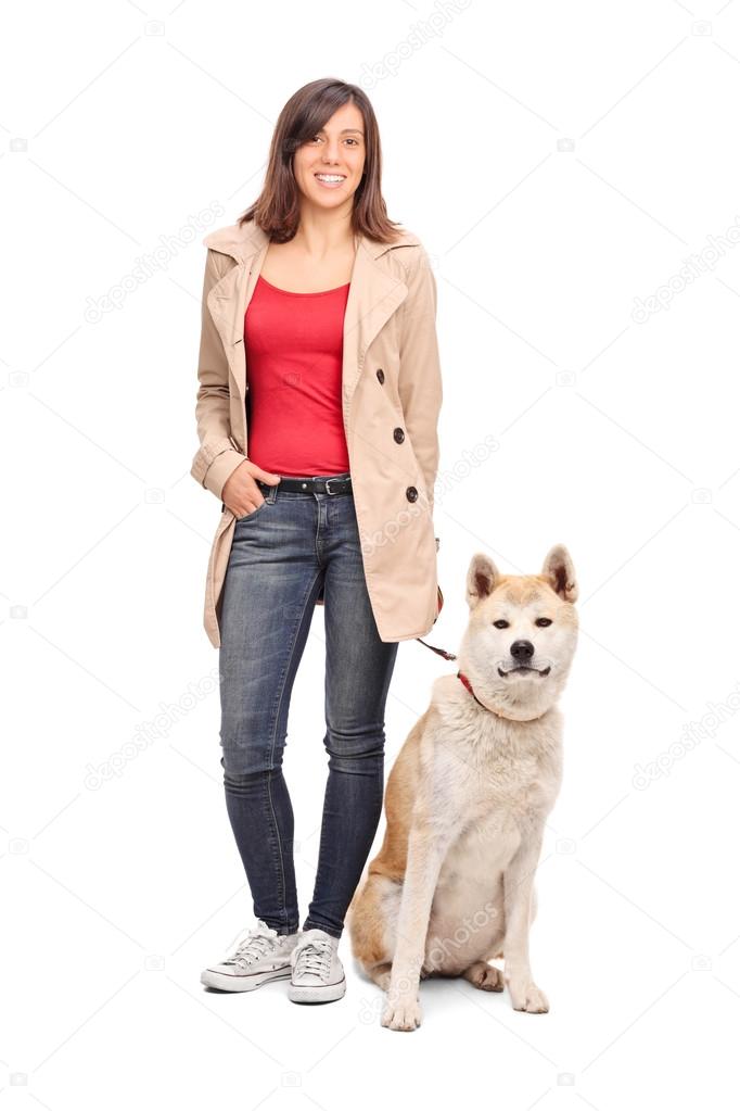Young girl posing with dog