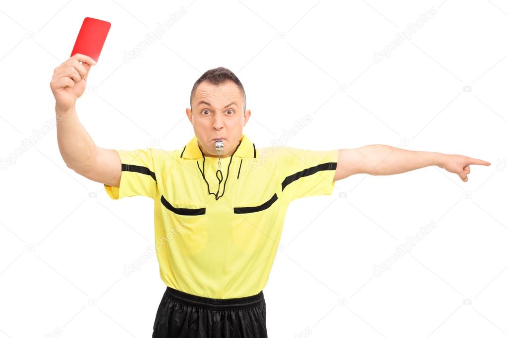 Football referee showing a red card