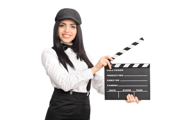 Female director holding clapper board — Stock Photo, Image