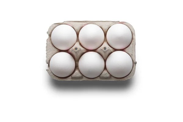 Six white eggs in a box — Stock Photo, Image