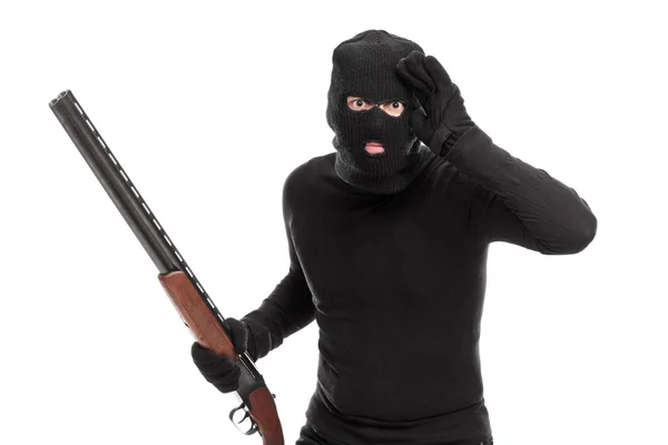 Burglar in black with rifle — Stock Photo, Image