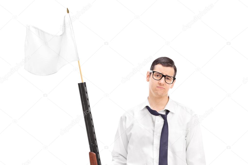 Guy holding a rifle with white flag