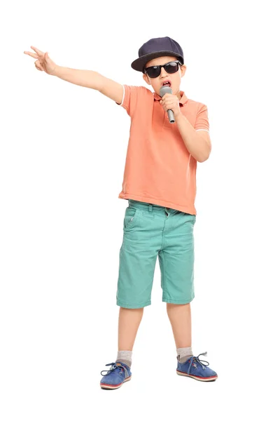 Little boy rapping on a microphone — Stock Photo, Image