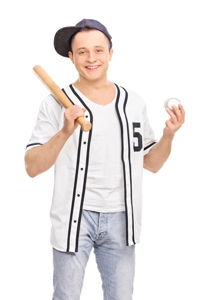 Jovem jogador de beisebol segurando um taco — Fotografia de Stock