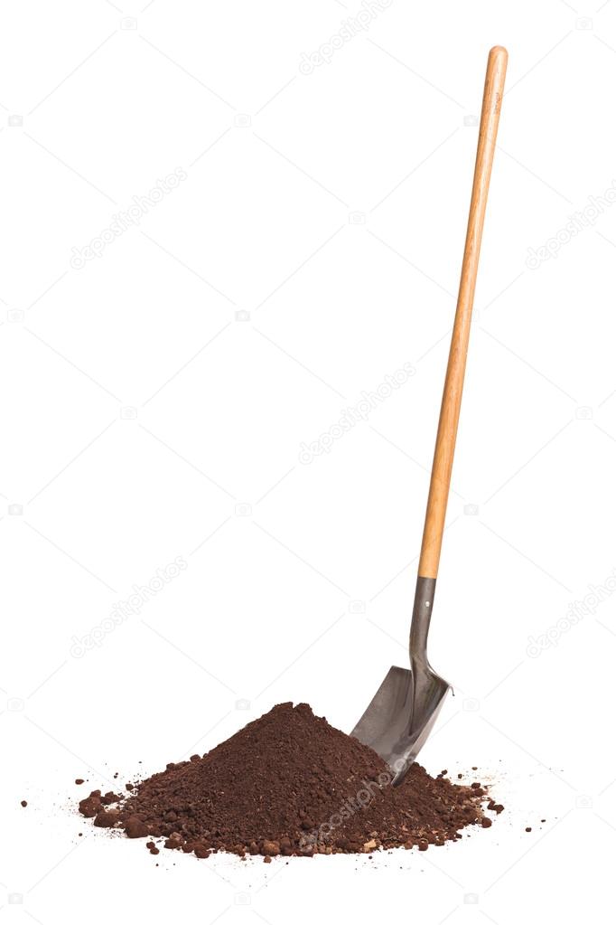Shovel stuck in a pile of dirt