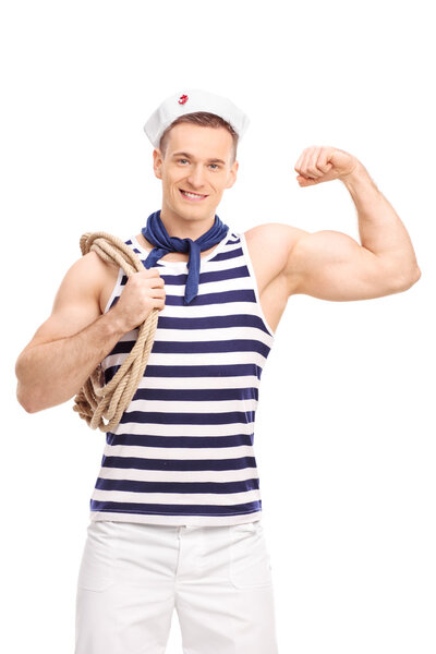 Male sailor showing his bicep