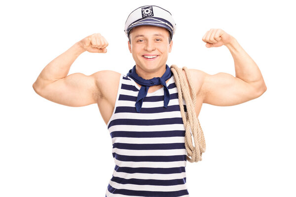 Strong sailor showing his biceps 