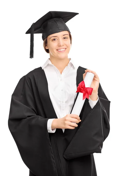 Mulher em vestido de formatura com um diploma — Fotografia de Stock
