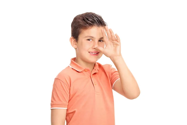 Junge macht eine kindische Handbewegung — Stockfoto