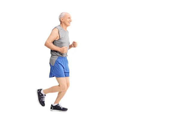 Cheerful senior jogging in sportswear — Stock Photo, Image