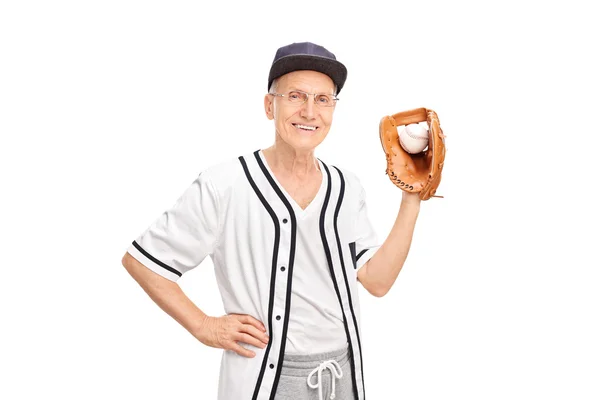 Senior man holding a baseball — Stock Photo, Image