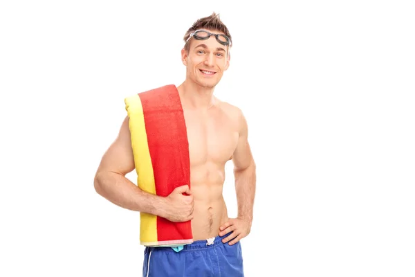 Junger Mann mit Schwimmbrille — Stockfoto