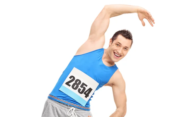 Germe egzersiz yaparak erkek atlet — Stok fotoğraf