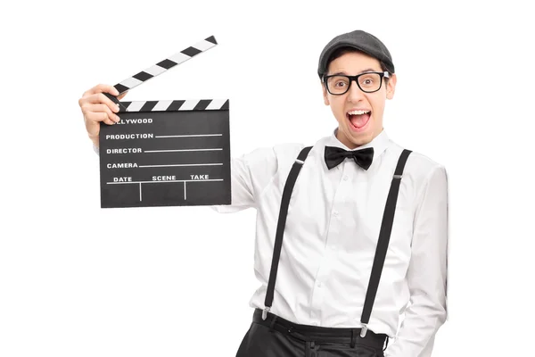 Movie director holding a movie clapperboard — Stock Photo, Image