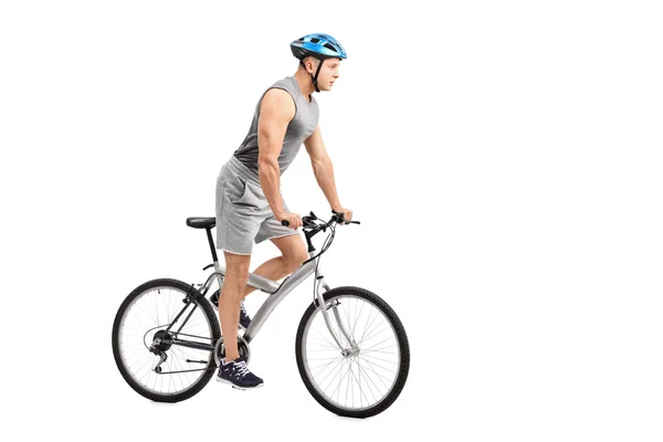 Young biker riding a bicycle — Stock Photo, Image