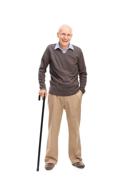 Hombre mayor con un bastón sonriendo — Foto de Stock