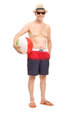 Komuta sizde bir plaj topu tutan