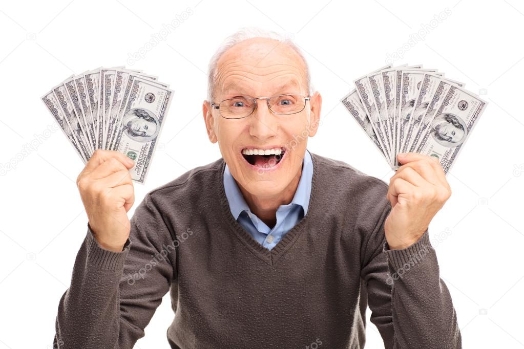 senior man holding money in hands