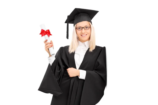 Female college graduate holding a diploma — Stock Photo, Image