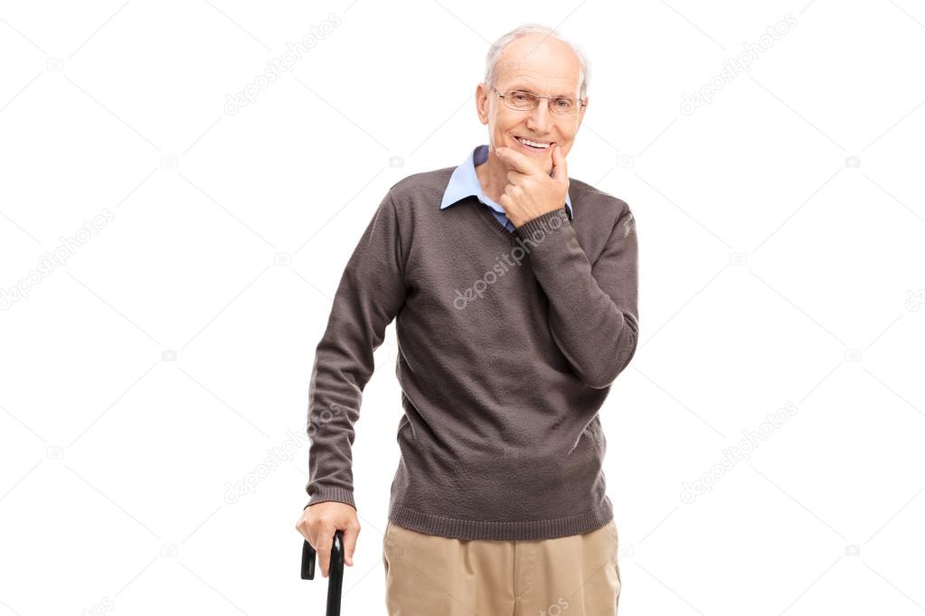 Casual senior man with wooden cane