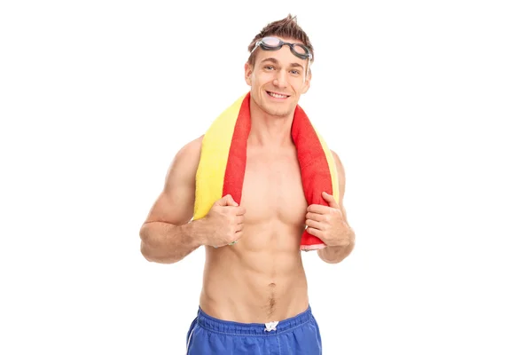 Schöner junger Mann mit Schwimmbrille — Stockfoto