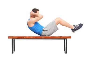 male athlete doing stomach crunches